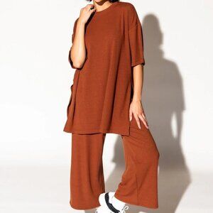 Dressed in Lala Ribbed Playsuit in Marshmallow